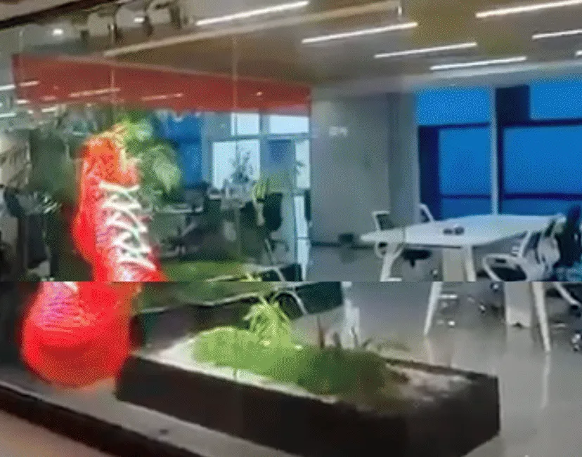 Vidrio de oficina con LED Film que muestra un tenis rojo